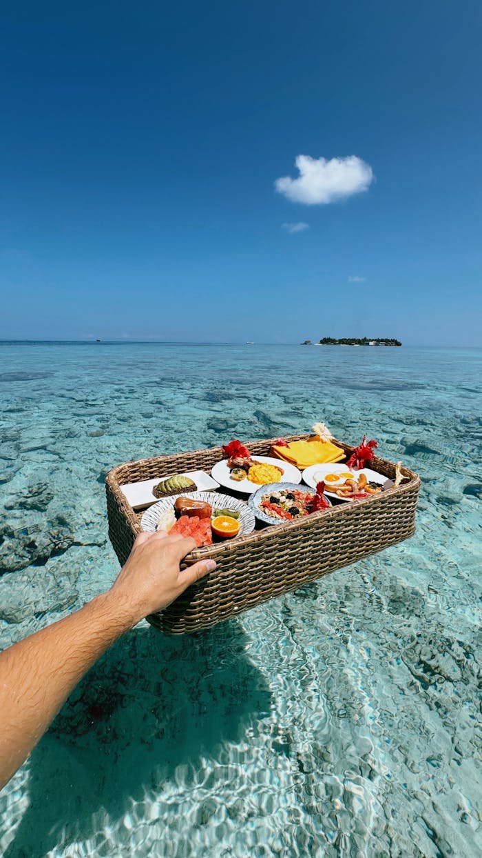 Enjoy a tropical breakfast served on crystal clear waters in the Maldives.